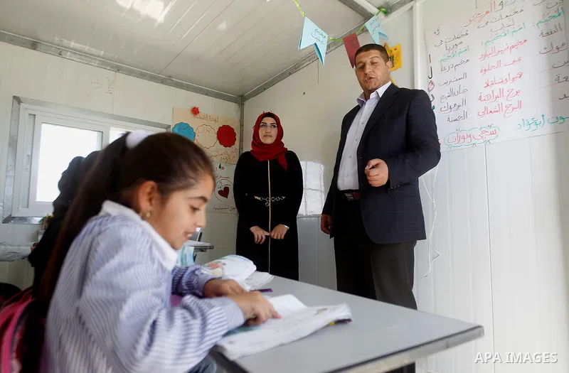 Palestinian students from Guwein primary mixed school learns inside their classrooms in south of al-Samou village in the West Bank city of Hebron, on Oct. 25, 2016. Guwein school funded by the French goverment learn insi...