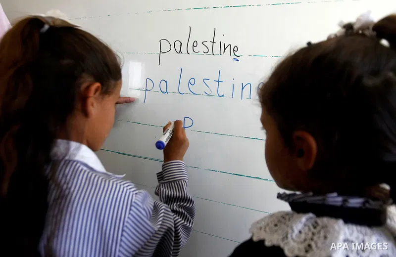 Palestinian students from Guwein primary mixed school learns inside their classrooms in south of al-Samou village in the West Bank city of Hebron, on Oct. 25, 2016. Guwein school funded by the French goverment learn insi...