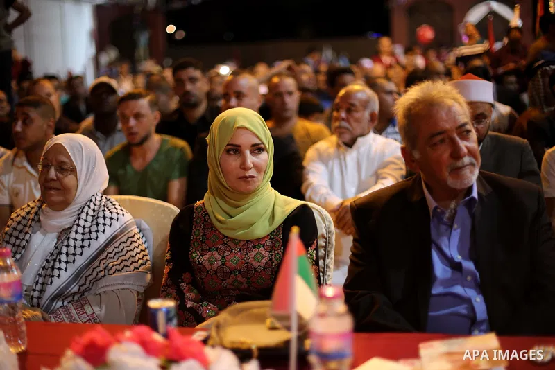 Ms. Jalila Dahlan attends a mass wedding ceremony in Gaza city on Oct. 25, 2016. Nearly 20 Palestinian couples from War-wounded were married in a ceremony funded by the UAE government. Photo by Mohammed Asad