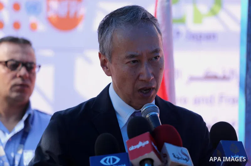 Japanese Ambassador to Palestine, Takeshi Okubo, Speaks during the unveiling of the foundation stone during a rally of the Breast Cancer Awareness campaign, in Gaza City on Oct. 26, 2016. Photo by Mohammed Asad