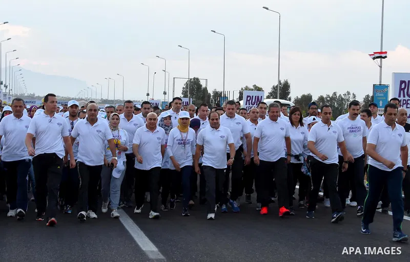 Egyptian President Abdel Fattah al-Sisi takes part during the Peace marathon in the Red Sea resort of Sharm Al-Sheikh, in the South Sinai governorate, south of Cairo, Egypt, on Oct. 26, 2016. Photo by Egyptian President...