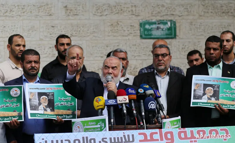 Deputy Speaker of the Legislative Council, Ahmed Bahar speaks during a protest to show solidarity with Leader of the northern Islamic Movement Sheikh Raed Salah who is in solitary confinement in Israeli jails in front of...