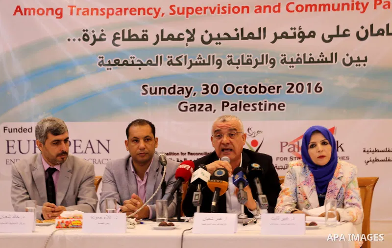 Palestinians take part in a seminar "Two years after donors' conference of Gaza Strip reconstruction", in Gaza city, on Ocyober 30, 2016. Photo by Mohammed Asad