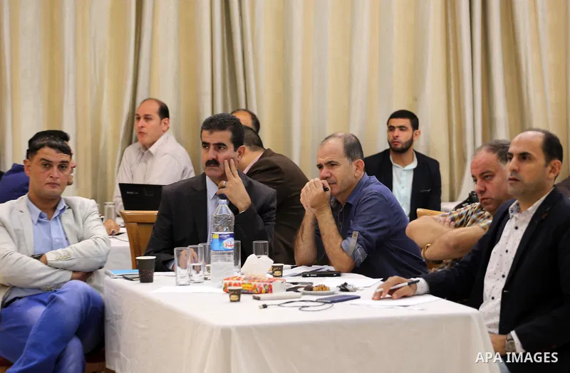 Palestinians take part in a seminar "Two years after donors' conference of Gaza Strip reconstruction", in Gaza city, on Ocyober 30, 2016. Photo by Mohammed Asad