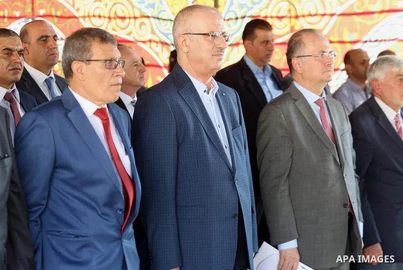 Palestinian Prime Minister, Rami Hamadallah, attends the Opening the Palestine Company for the production and marketing of fresh herbs,in Jeftlek village near Jordan Valley in the West Bank, on Oct 30, 2016. Photo by Pri...