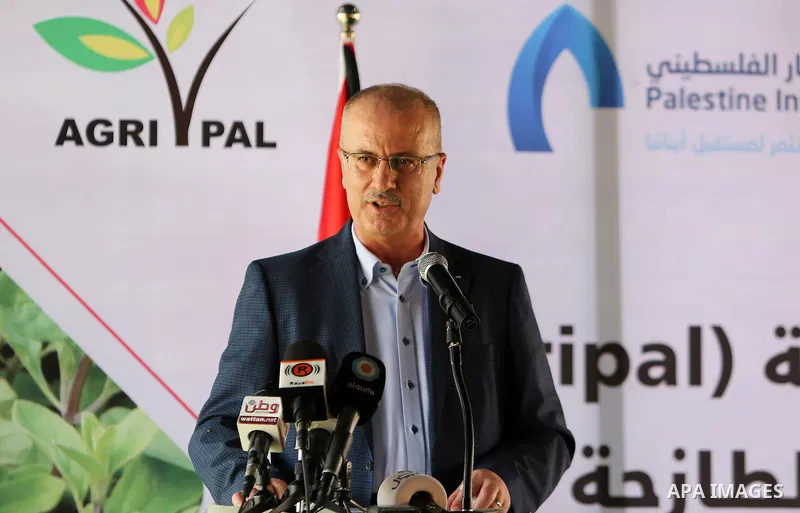 Palestinian Prime Minister, Rami Hamadallah, attends the Opening the Palestine Company for the production and marketing of fresh herbs,in Jeftlek village near Jordan Valley in the West Bank, on Oct 30, 2016. Photo by Pri...