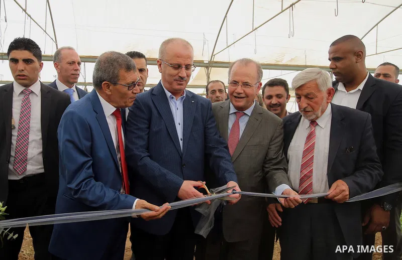 Palestinian Prime Minister, Rami Hamadallah, attends the Opening the Palestine Company for the production and marketing of fresh herbs,in Jeftlek village near Jordan Valley in the West Bank, on Oct 30, 2016. Photo by Pri...