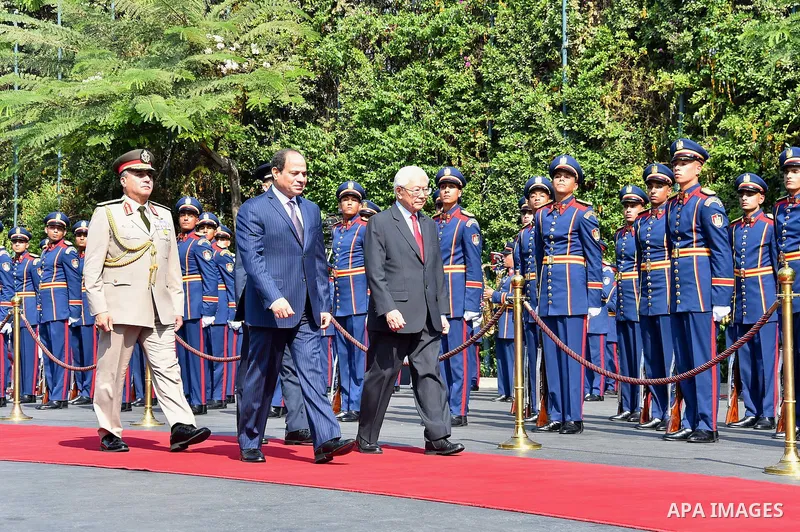 Egyptian President Abdel Fattah al-Sisi and Singapore's President Tony Tan reviewing a honor guard during a welcoming ceremony at the Presidential Palace in Cairo, Egypt, on October 31, 2016. Photo by Egyptian President...