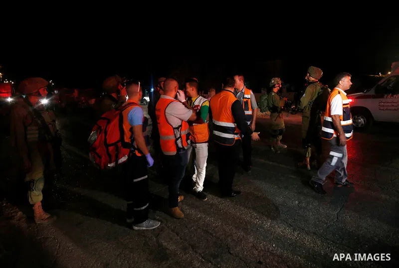 Israeli soldiers stand guard near the scene of a shooting attack by a Palestinian assailant at an Israeli military crossing point near the West Bank City of Ramallah October 31, 2016. The Israeli army said the gunman "op...