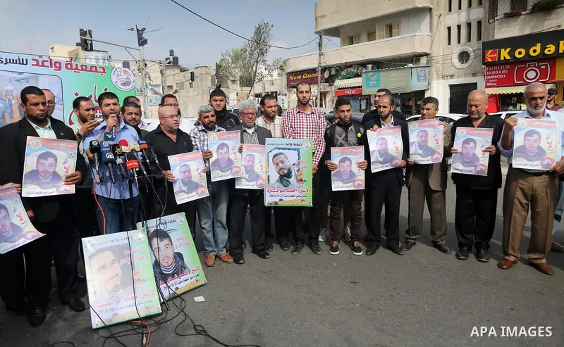 Palestinian supporters of the Islamic Jihad Movement, take part during a protest to show solidarity with Palestinian prisoners on hunger strike in Israeli Jails, in Gaza city on November 1, 2016. Photo by Mohammed Asad