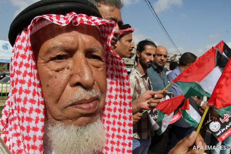 Palestinians hold banners during a demonstration to mark the anniversary of the Balfour Declaration, in Rafah in the southern Gaza strip, on November 1, 2016. The 1917 Balfour Declaration is a formal statement of policy...