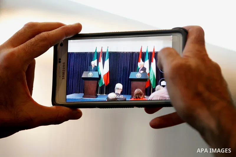 Palestinian President Mahmoud Abbas attends a joint news conference with Italy's President Sergio Mattarella in the West Bank city of Bethlehem November 1, 2016. Photo by Wisam Hashlamoun