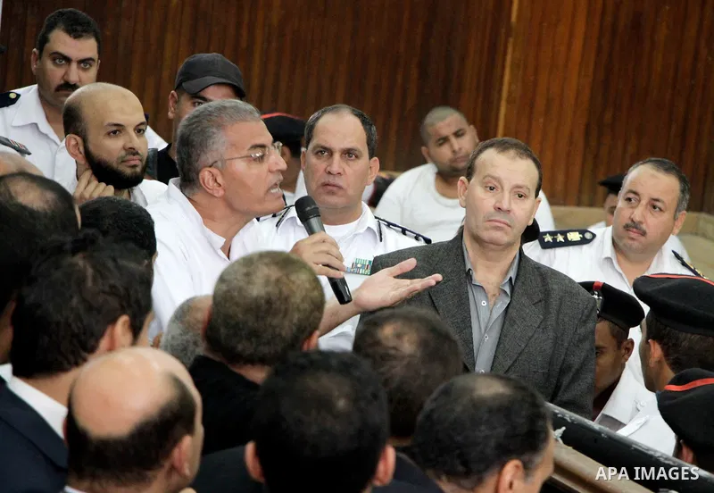 Relative of Egyptian Muslim Brotherhood defendants attend their trial, in a case known in media as "Rabaa Operations Room", in Cairo, on Nov. 1, 2016. Photo by Amr Sayed