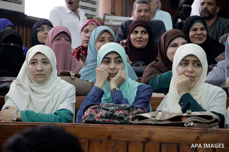 Relative of Egyptian Muslim Brotherhood defendants attend their trial, in a case known in media as "Rabaa Operations Room", in Cairo, on Nov. 1, 2016. Photo by Amr Sayed