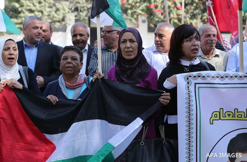 Palestinian supporters of the Popular Front for the Liberation of Palestine (PFLP), take part during a protest to show solidarity with Palestinian prisoners on hunger strike in Israeli Jails, in Gaza city on November 3,...