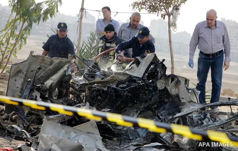 Egyptian police inspect the blast scene in Cairo's eastern district of Naser City, Egypt, on Nov. 4, 2016. An Egyptian judge escaped a car explosion in Cairo's eastern district of Naser City on Friday, the judge was not...