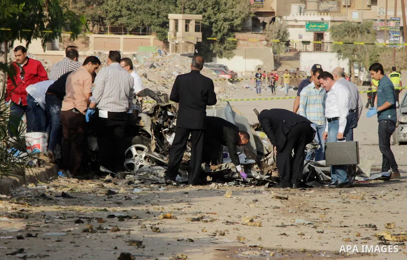 Egyptian police inspect the blast scene in Cairo's eastern district of Naser City, Egypt, on Nov. 4, 2016. An Egyptian judge escaped a car explosion in Cairo's eastern district of Naser City on Friday, the judge was not...