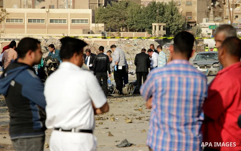 Egyptian police inspect the blast scene in Cairo's eastern district of Naser City, Egypt, on Nov. 4, 2016. An Egyptian judge escaped a car explosion in Cairo's eastern district of Naser City on Friday, the judge was not...