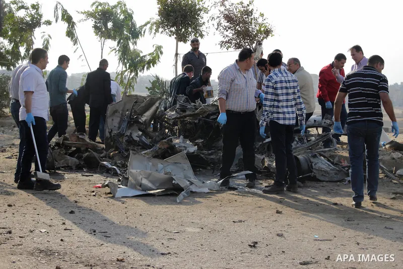 Egyptian police inspect the blast scene in Cairo's eastern district of Naser City, Egypt, on Nov. 4, 2016. An Egyptian judge escaped a car explosion in Cairo's eastern district of Naser City on Friday, the judge was not...