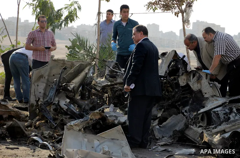 Egyptian police inspect the blast scene in Cairo's eastern district of Naser City, Egypt, on Nov. 4, 2016. An Egyptian judge escaped a car explosion in Cairo's eastern district of Naser City on Friday, the judge was not...