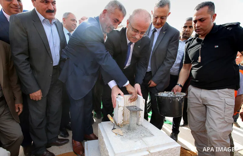 Palestinian Prime Minister, Rami Hamdallah, lays foundation stone for the housing cooperative engineers Tulkarem, in the West Bank city of Ramallah, on November 5, 2016. Photo by Prime Minister Office