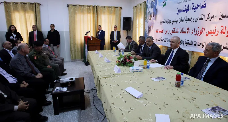 Palestinian Prime Minister, Rami Hamdallah, lays foundation stone for the housing cooperative engineers Tulkarem, in the West Bank city of Ramallah, on November 5, 2016. Photo by Prime Minister Office