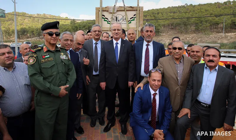 Palestinian Prime Minister, Rami Hamdallah, lays foundation stone for the housing cooperative engineers Tulkarem, in the West Bank city of Ramallah, on November 5, 2016. Photo by Prime Minister Office