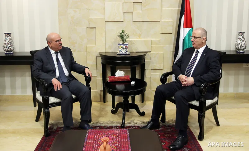 Palestinian Prime Minister Rami Hamdallah meets with Qatar's Ambassador to the Palestinian Authority, Mohammed Al Emadi in the West Bank city of Ramallah, on Nov. 06, 2016. Photo by Prime Minister Office