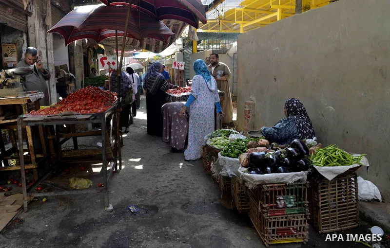 Egyptians shop at a market in Cairo, Egypt, on November 7, 2016. Photo by Amr Sayed