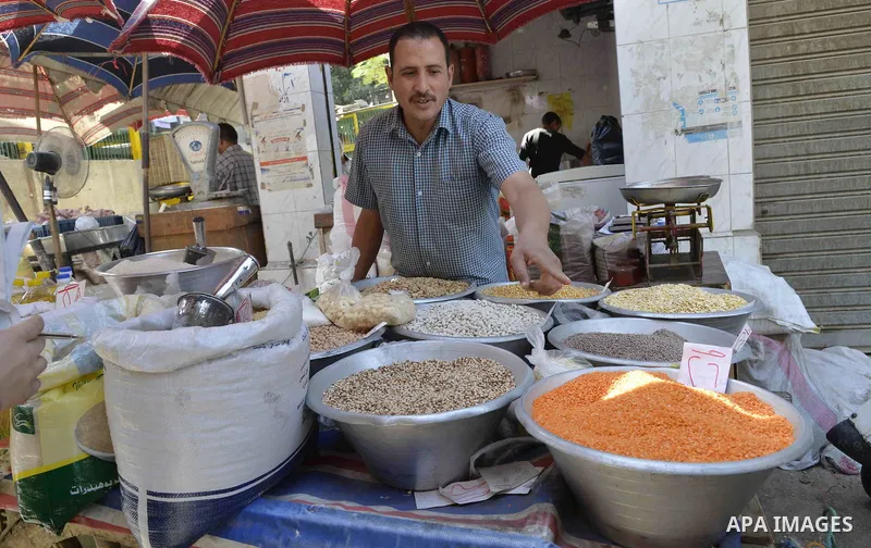 Egyptians shop at a market in Cairo, Egypt, on November 7, 2016. Photo by Amr Sayed