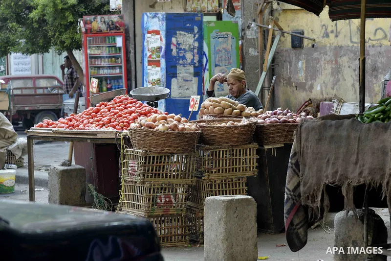 Egyptians shop at a market in Cairo, Egypt, on November 7, 2016. Photo by Amr Sayed