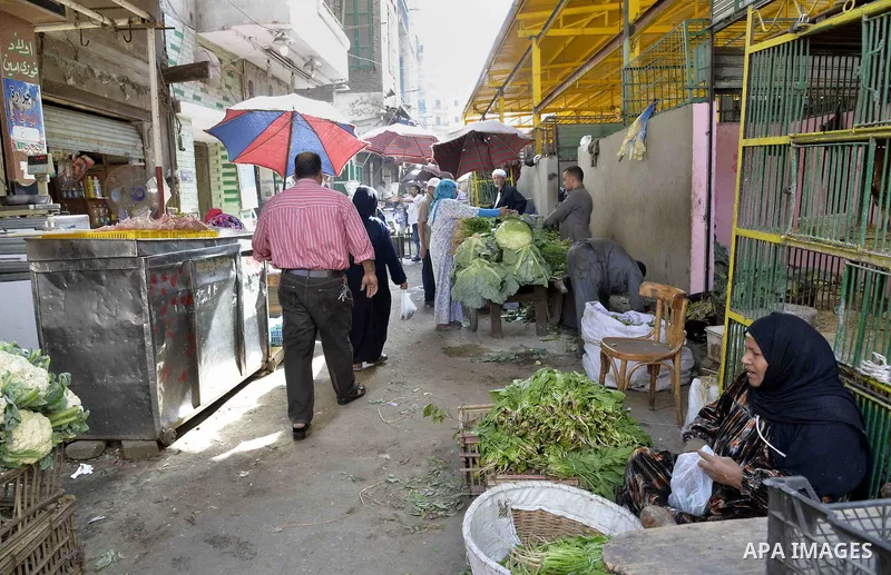 Egyptians shop at a market in Cairo, Egypt, on November 7, 2016. Photo by Amr Sayed