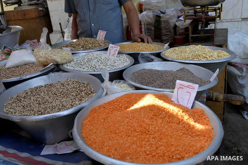 Egyptians shop at a market in Cairo, Egypt, on November 7, 2016. Photo by Amr Sayed