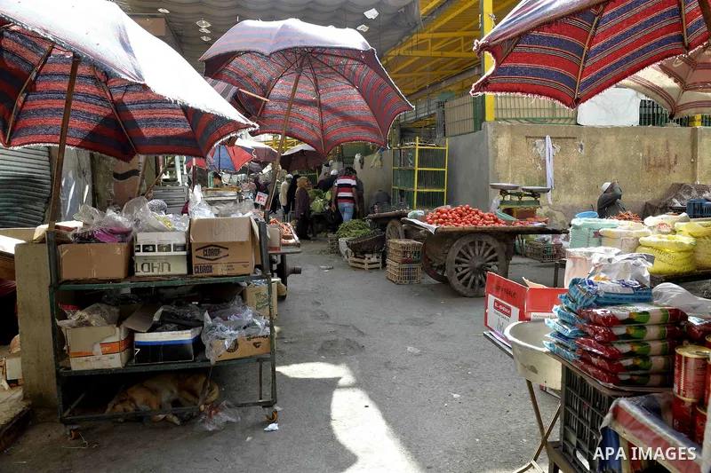 Egyptians shop at a market in Cairo, Egypt, on November 7, 2016. Photo by Amr Sayed