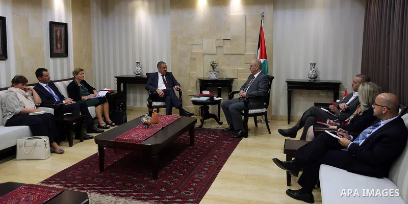 Palestinian Prime Minister, Rami Hamdallah, meets with Representative of the European Union in Palestine Ralf Traf, in the West Bank city of Ramallah, on November 7, 2016. Photo by Prime Minister Office