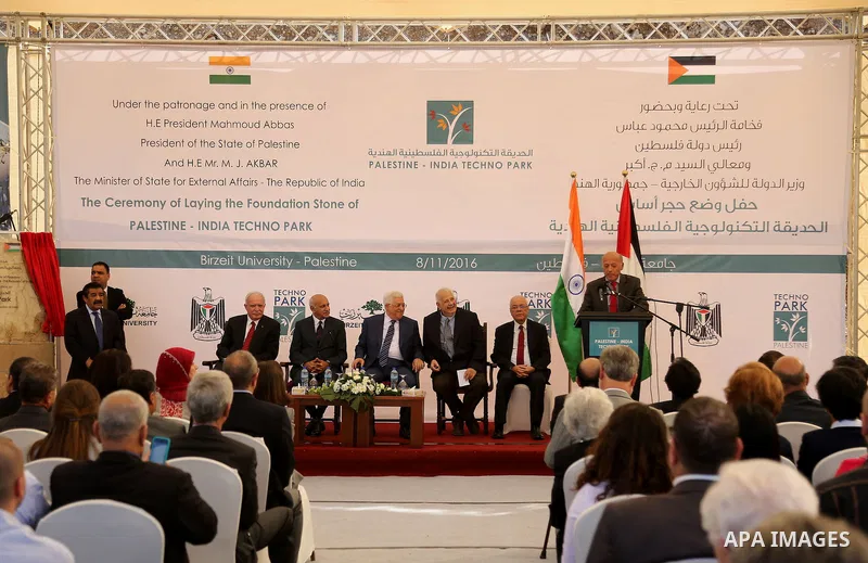 Palestinian President Mahmoud Abbas and India's Minister of State for External Affairs, attend a ceremony of laying the foundation stone of Palestine-India Techno Park, near the West Bank city of Ramallah November 8, 201...
