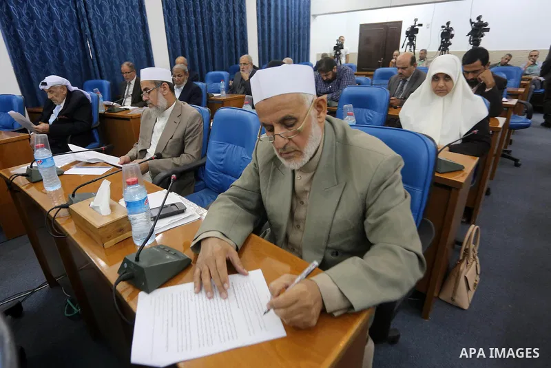Members of the Palestinian legislative council from Hamas movement attend a meeting at the legislative council in Gaza city, on November 9, 2016. Photo by Mohammed Asad