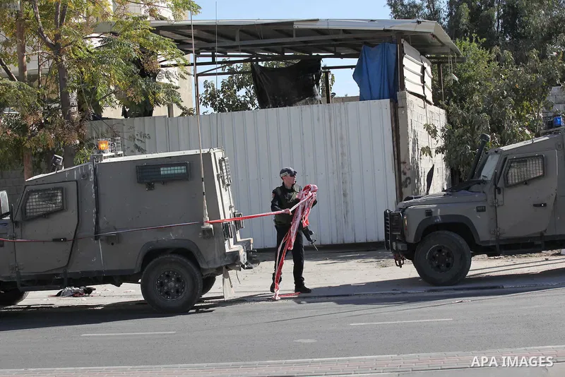 Israeli security forces search the scene where the Israeli military said a Palestinian stabbed a soldier with screwdriver before he was shot, in the West Bank village of Hawara near Nablus, November 9, 2016. Photo by Ned...