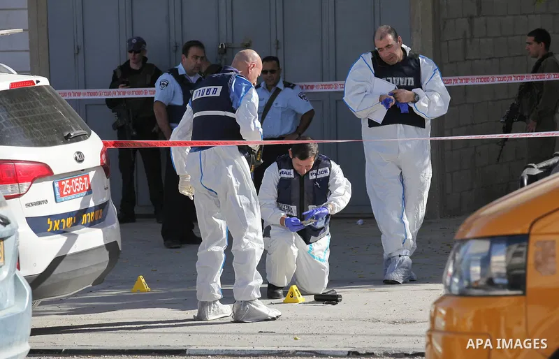 Israeli security forces search the scene where the Israeli military said a Palestinian stabbed a soldier with screwdriver before he was shot, in the West Bank village of Hawara near Nablus, November 9, 2016. Photo by Ned...