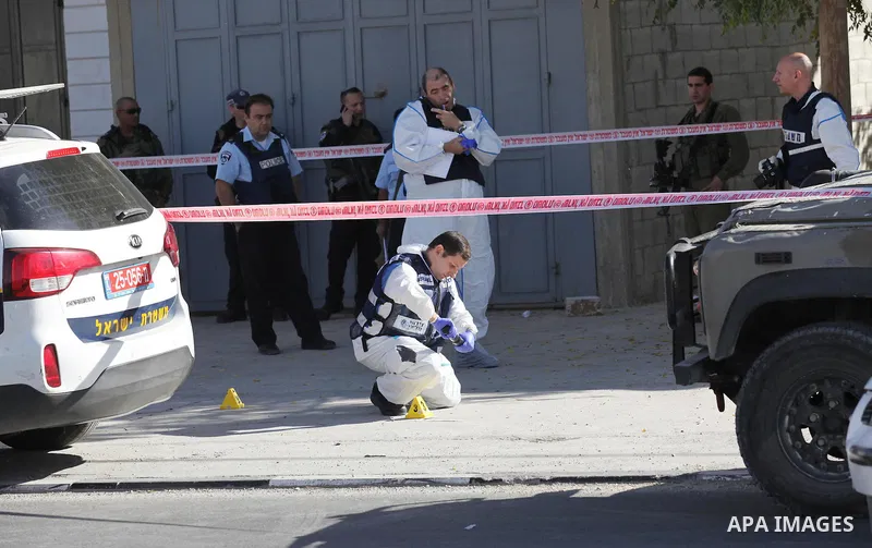 Israeli security forces search the scene where the Israeli military said a Palestinian stabbed a soldier with screwdriver before he was shot, in the West Bank village of Hawara near Nablus, November 9, 2016. Photo by Ned...