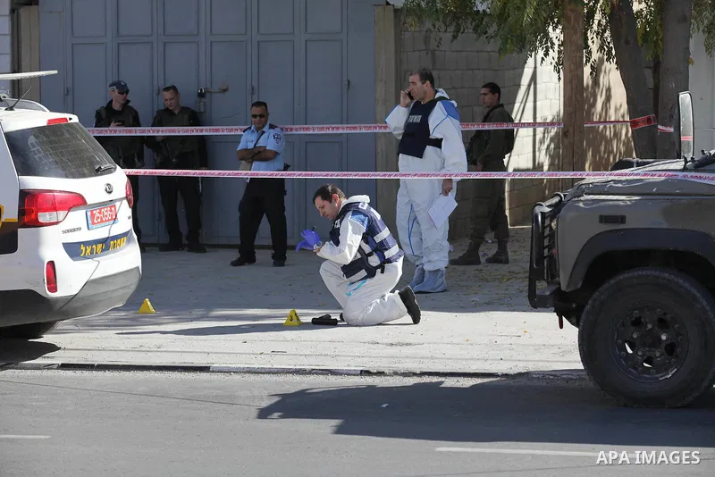 Israeli security forces search the scene where the Israeli military said a Palestinian stabbed a soldier with screwdriver before he was shot, in the West Bank village of Hawara near Nablus, November 9, 2016. Photo by Ned...