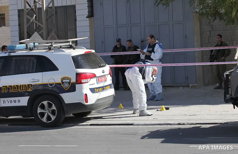 Israeli security forces search the scene where the Israeli military said a Palestinian stabbed a soldier with screwdriver before he was shot, in the West Bank village of Hawara near Nablus, November 9, 2016. Photo by Ned...