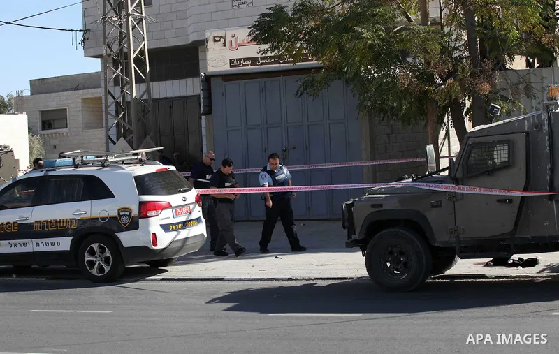 Israeli security forces search the scene where the Israeli military said a Palestinian stabbed a soldier with screwdriver before he was shot, in the West Bank village of Hawara near Nablus, November 9, 2016. Photo by Ned...