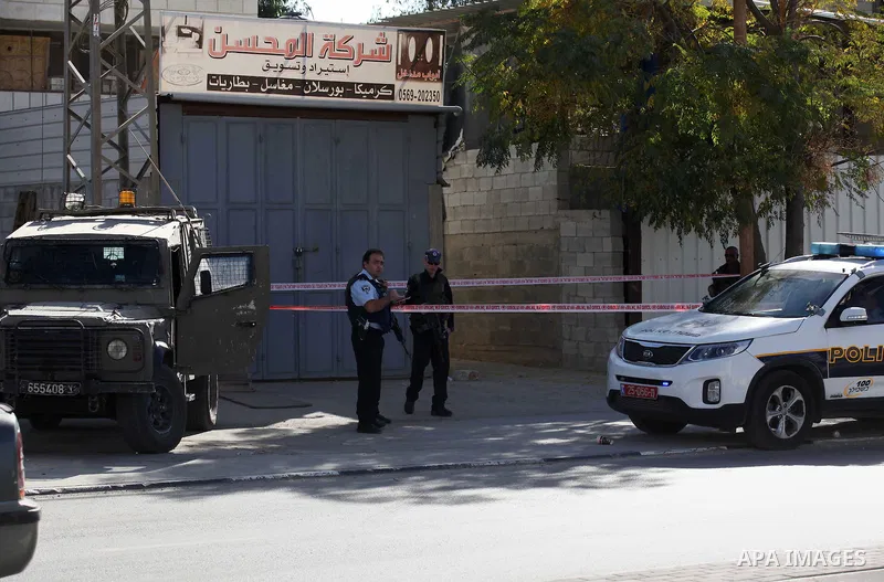 Israeli security forces search the scene where the Israeli military said a Palestinian stabbed a soldier with screwdriver before he was shot, in the West Bank village of Hawara near Nablus, November 9, 2016. Photo by Ned...
