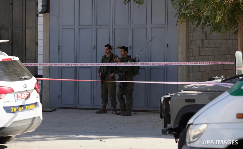 Israeli security forces search the scene where the Israeli military said a Palestinian stabbed a soldier with screwdriver before he was shot, in the West Bank village of Hawara near Nablus, November 9, 2016. Photo by Ned...