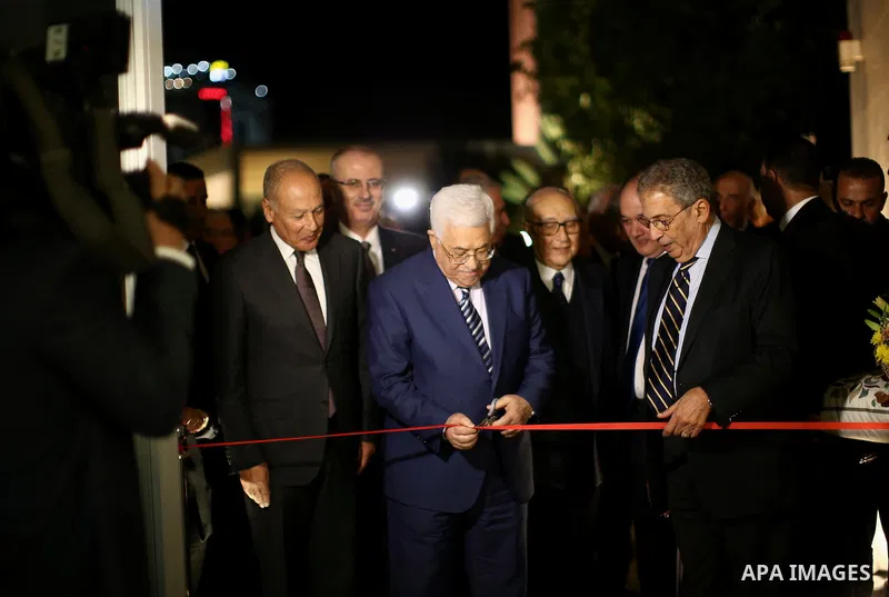 Palestinian President Mahmoud Abbas opens the museum of late Palestinian leader Yasser Arafat with Secretary General of the Arab League Ahmed Aboul Gheit and former Secretary-General of the Arab League Amr Mousa in the W...
