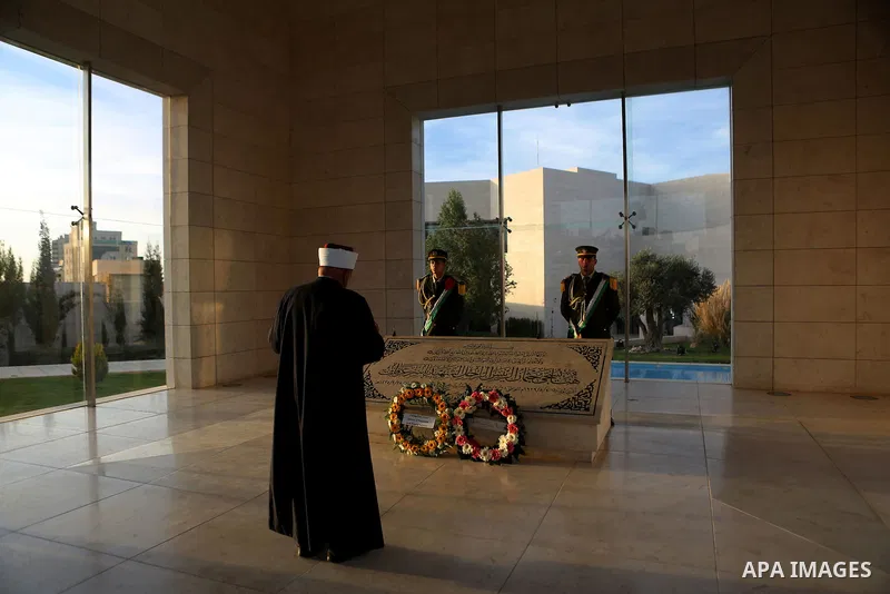 A Palestinian man prays in front of the tomb of the late Palestinian leader Yasser Arafat during the inauguration ceremony of late Palestinian leader Yasser Arafat's Museum in the West Bank city of Ramallah on November 9...
