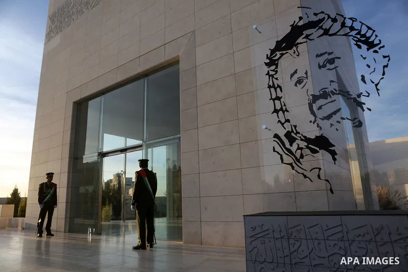 A Palestinian honor guard stand guard at the tomb of the late Palestinian leader Yasser Arafat during the inauguration ceremony of late Palestinian leader Yasser Arafat's Museum in the West Bank city of Ramallah on Novem...