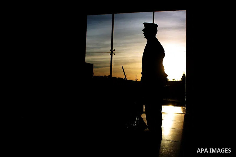 A Palestinian honor guard stand guard at the tomb of the late Palestinian leader Yasser Arafat during the inauguration ceremony of late Palestinian leader Yasser Arafat's Museum in the West Bank city of Ramallah on Novem...