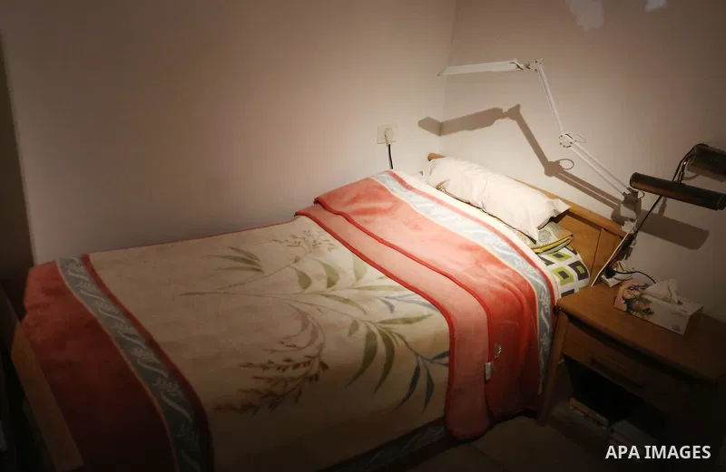 A picture shows a recreation of the small bedroom where late Palestinian leader Yasser Arafat spent his final years at the late Palestinian leader Yasser Arafat's Museum in the West Bank city of Ramallah on November 9, 2...